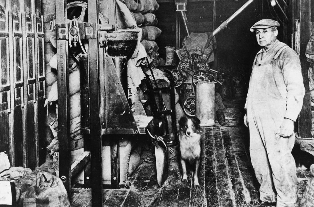 Workers and machinery inside the Hebron Mill